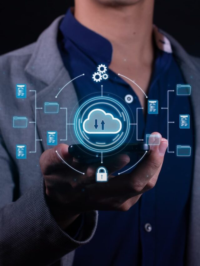 Person holding a smartphone with a holographic display of a cloud computing concept, featuring a cloud icon, gears, folder icons, and a lock symbol.