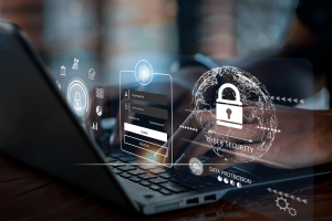 A person types on a laptop with digital graphics overlaying login forms, a globe, a padlock, and icons representing cybersecurity and data protection.